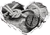 corde de bateau et une boussole sur fond de bois effet de charbon de bois En forme de coeur dans ...